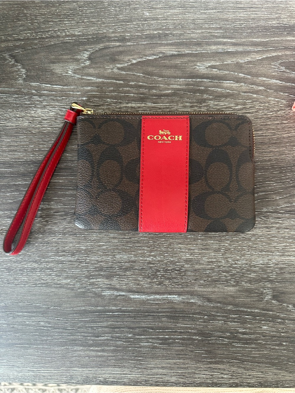 Coach Brown Signature Canvas Wristlet with Red Center Stripe